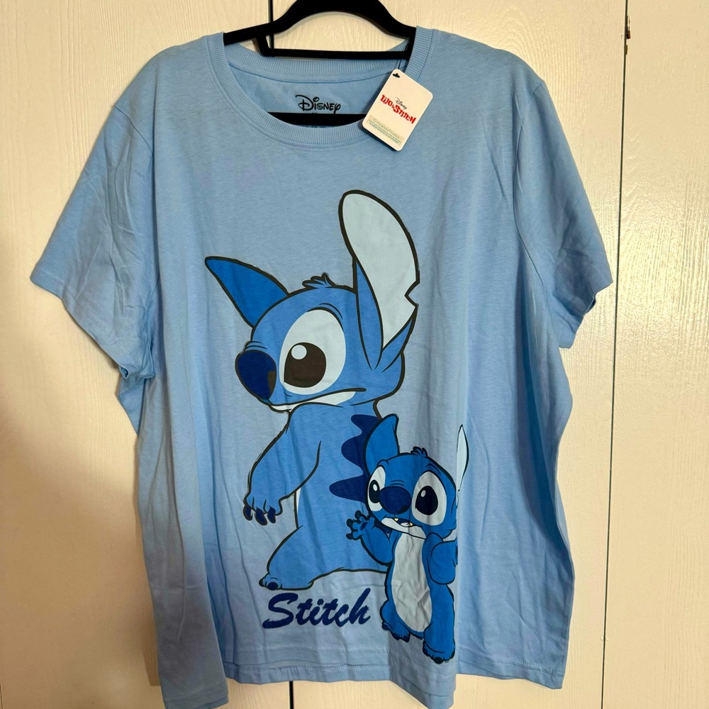 NWT. Disney Primark Stitch blue shortsleeved tee. Sizes: 2X, XL